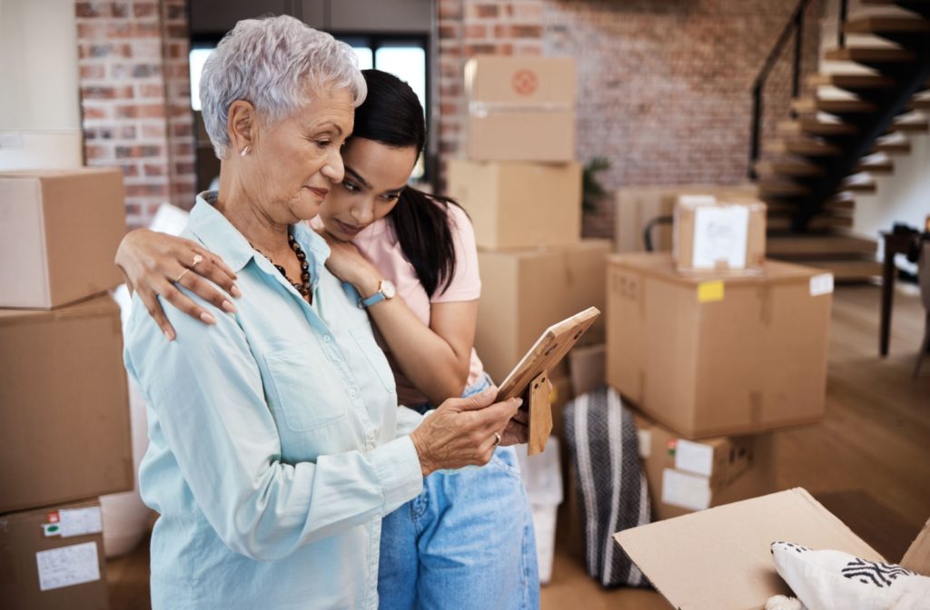 an older woman and her daughter are preparing for the big move into her senior home.